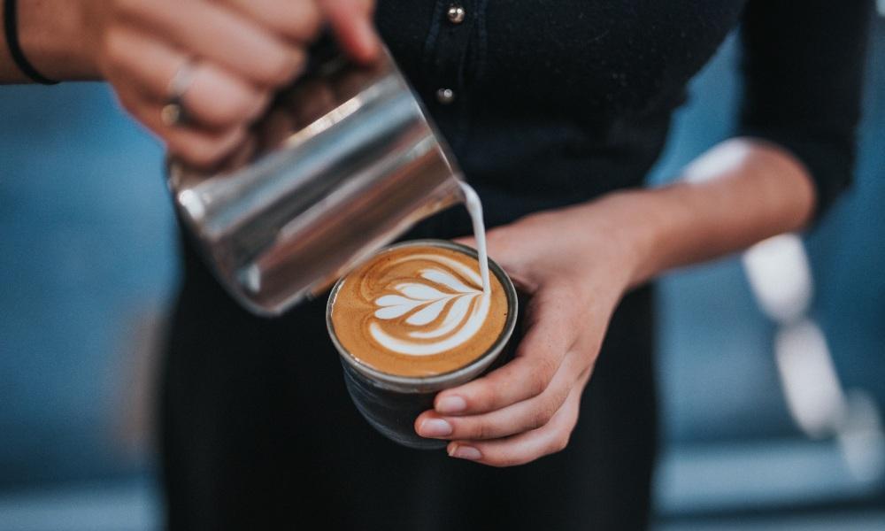 automation barista pouring coffee